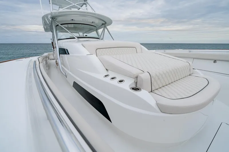 Slide: The Image of 2026 Valhalla Boatworks V-55 luxury yacht with sleek design and comfortable seating. - 4