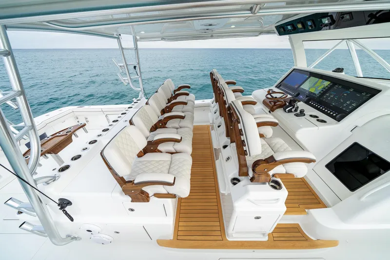 Slide: The Image of 2026 Valhalla Boatworks V-55 cockpit with luxurious seating and advanced navigation system. - 9