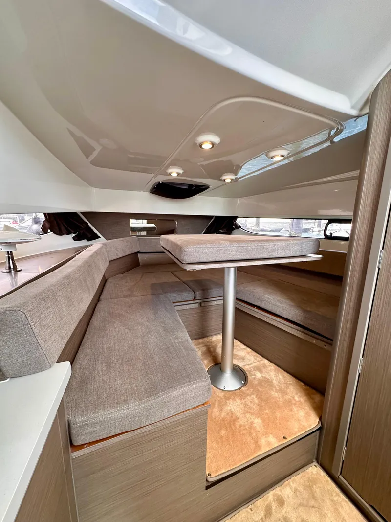 Slide: The Image of 2023 Beneteau Flyer 9 SUNdeck interior with cozy seating and modern design. - 19