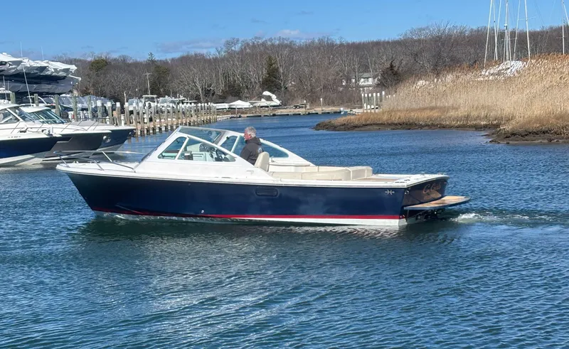 Slide: The Image of 2015 Hunt Yachts Harrier 25 Sport cruising on a calm waterway. - 3