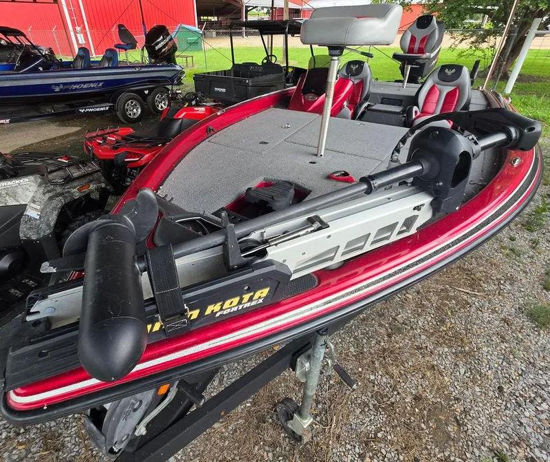 Slide: The Image of Red 2018 Phoenix 819 Pro boat with spacious deck and comfortable seating. - 4