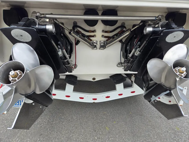 Slide: The Image of 1995 Fountain 38 Sport Cruiser dual propellers and outdrives, rear view. - 15