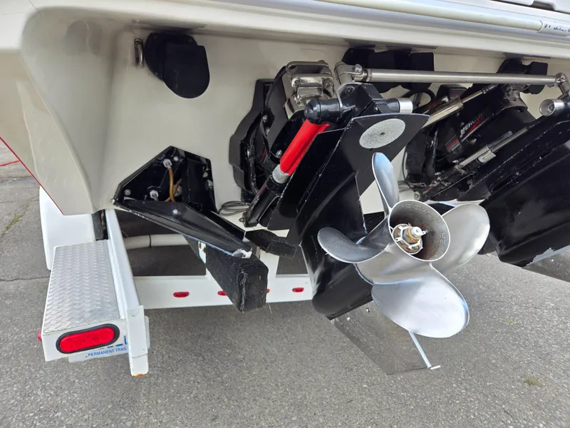 Slide: The Image of 1995 Fountain 38 Sport Cruiser boat propeller and stern drive detail. - 16