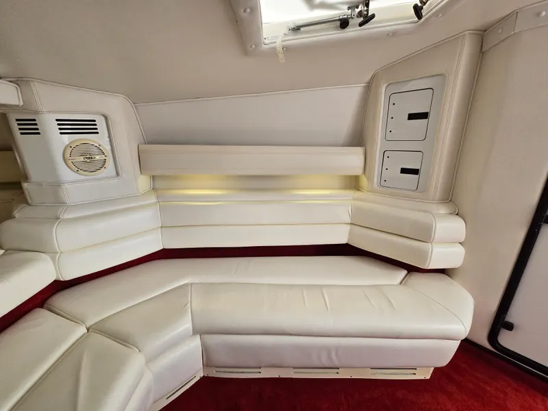 Slide: The Image of Luxurious white leather seating in 1995 Fountain 38 Sport Cruiser interior. - 41