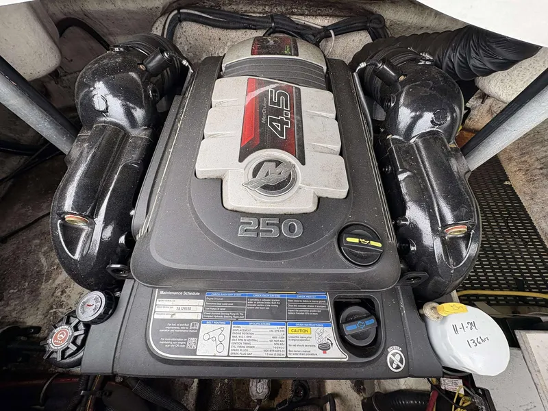 Slide: The Image of Engine of a 2015 Monterey 224FS boat, featuring a 4.5L 250 horsepower motor. - 14