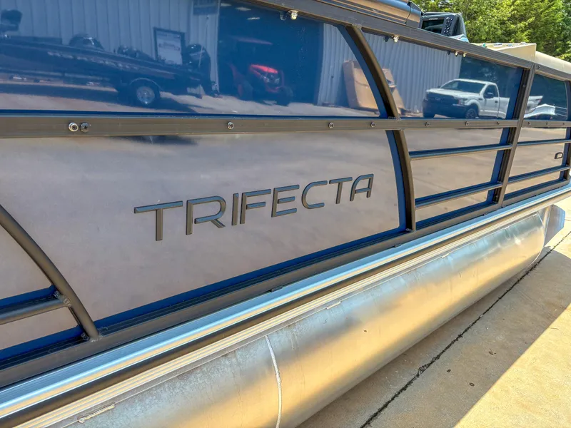 Slide: The Image of 2025 Trifecta CS 24RF 3.0 pontoon boat side view with logo. - 15