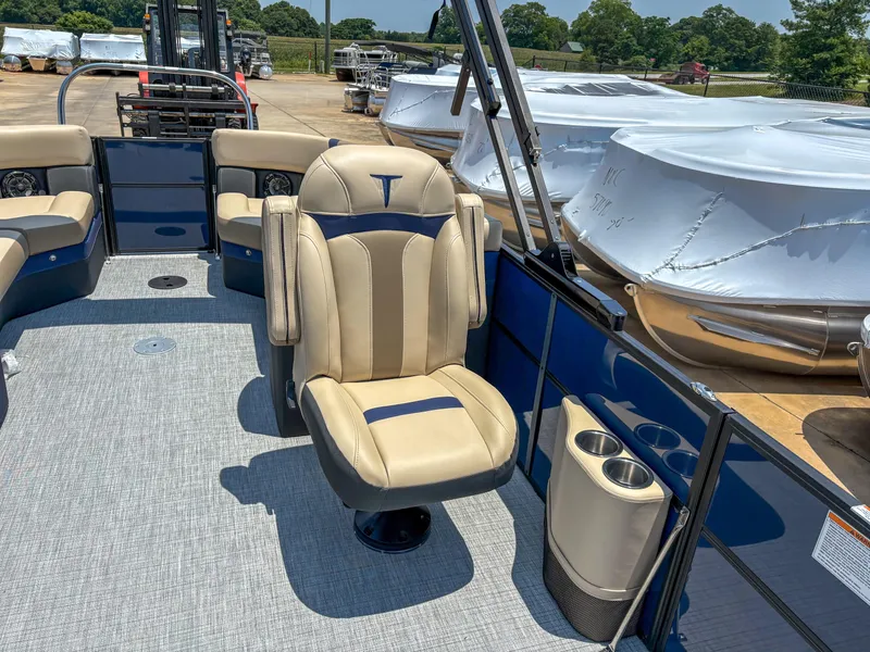 Slide: The Image of Luxurious seating on 2025 Trifecta CS 24RF 3.0 pontoon boat, featuring beige upholstery. - 7
