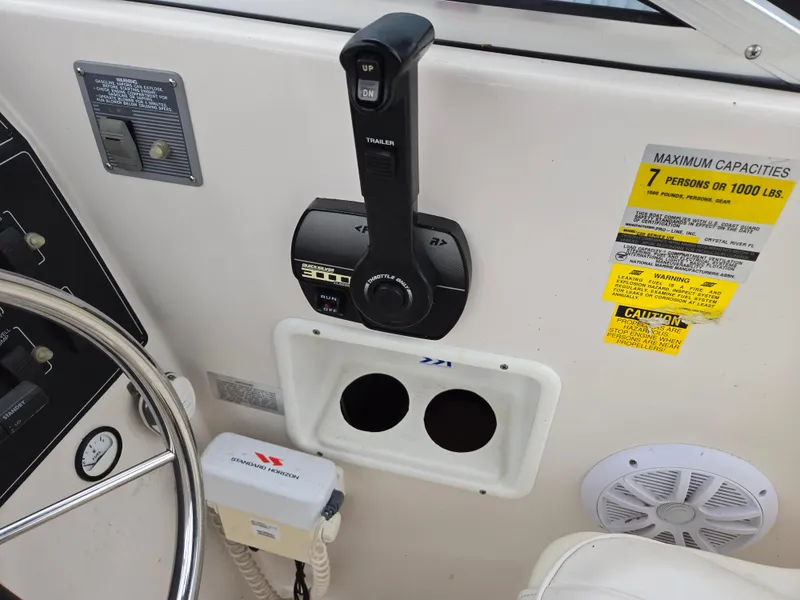 Slide: The Image of 1997 Pro-Line 201 Walkaround boat controls and capacity label. - 23
