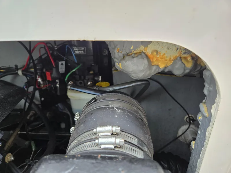 Slide: The Image of Close-up of 1997 Pro-Line 201 Walkaround engine compartment with visible wiring and components. - 37