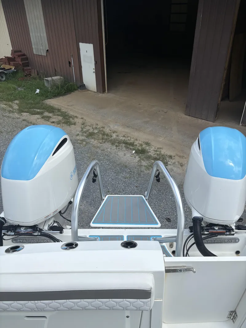 Slide: The Image of 2020 World Cat 280 CC-X boat with dual engines and rear platform. - 5
