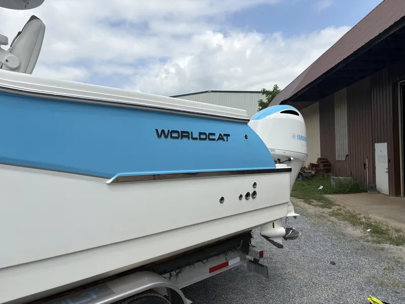 Slide: The Image of 2020 World Cat 280 CC-X boat with Yamaha engine, parked outdoors. - 6