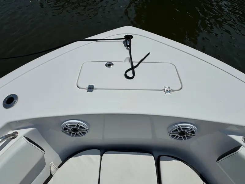 Slide: The Image of Bow of 2022 Tidewater 220 LXF boat with speakers and storage hatch. - 9