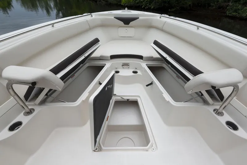 Slide: The Image of Bow of 2024 Sailfish 241 CC boat with anchor and marina view. - 4