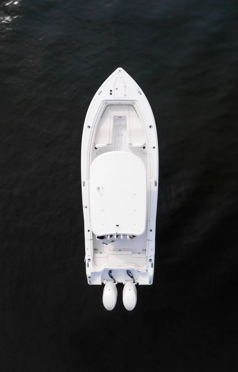 Slide: The Image of Castaway Marine logo with contact details and website for Sea Hunt Ultra 265 SE 2025. - 32