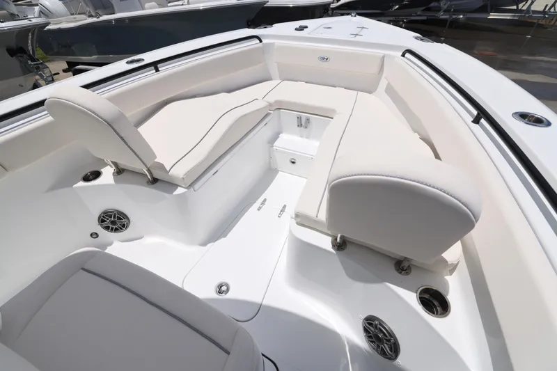 Slide: The Image of 2026 Sea Hunt Ultra 265 SE boat interior with Yamaha cooler and seating area. - 5