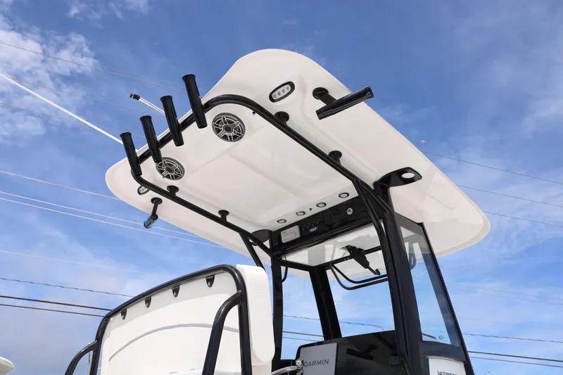 Slide: The Image of 2026 Sea Hunt Ultra 265 SE boat interior with white cushioned seating. - 6