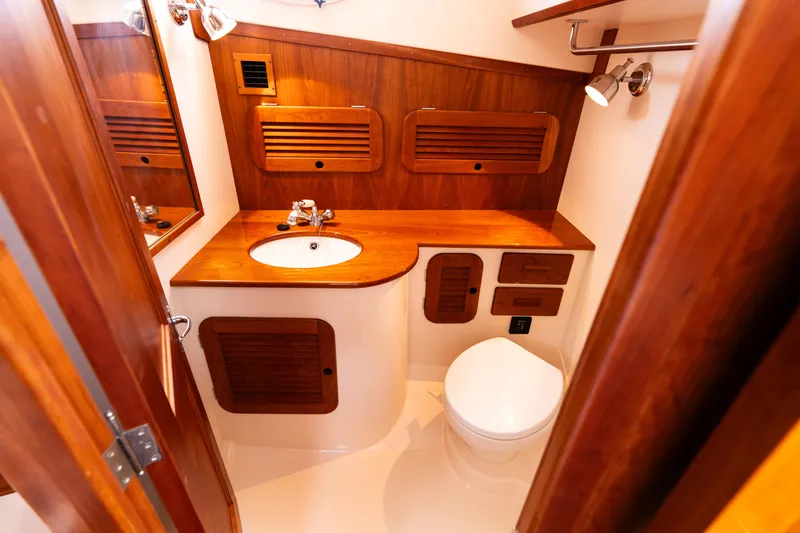 Slide: The Image of Luxurious wooden bathroom interior of 2015 Hinckley Picnic Boat 37 MKIII. - 36