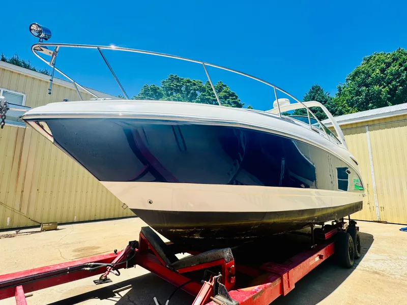 Slide: The Image of 2005 Chaparral Signature 270 boat on trailer, sunny day. - 1