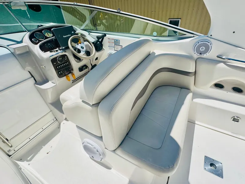 Slide: The Image of Interior of a 2005 Chaparral Signature 270 boat, white seating. - 13