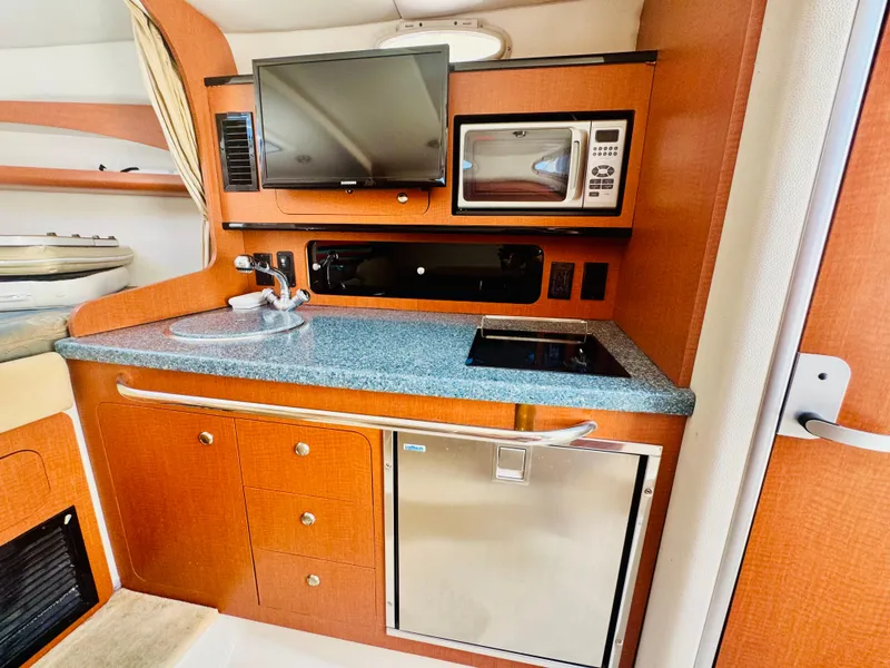 Slide: The Image of Galley in a 2005 Chaparral Signature 270 yacht. - 21