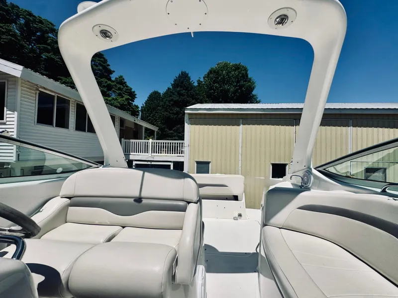 Slide: The Image of Interior of a 2005 Chaparral Signature 270 boat, beige upholstery. - 27