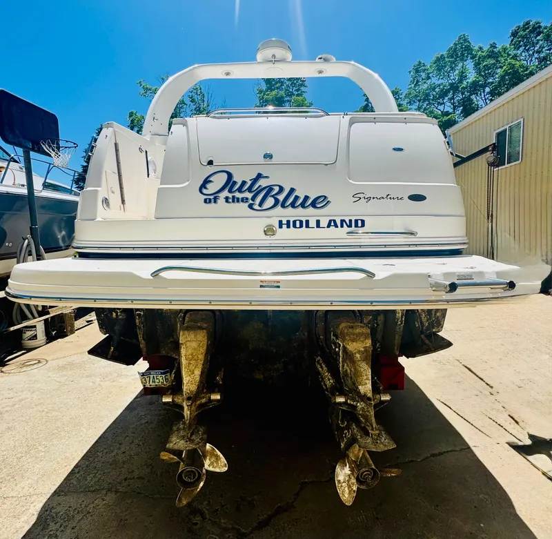 Slide: The Image of 2005 Chaparral Signature 270 boat outdoors, rear view. - 3