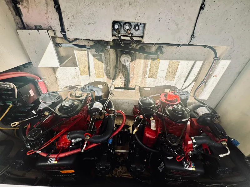 Slide: The Image of Engine compartment of a 2005 Chaparral Signature 270 boat with dual engines. - 34