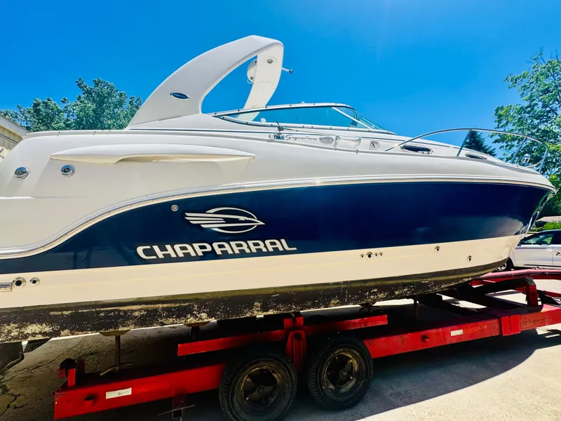 Slide: The Image of 2005 Chaparral Signature 270 boat on trailer, blue hull. - 5