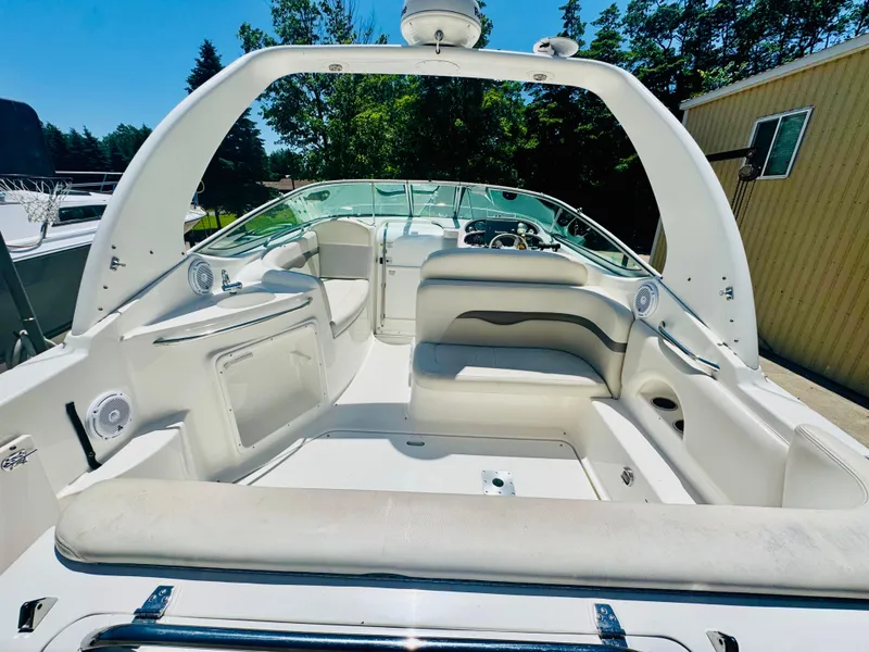 Slide: The Image of Interior of a 2005 Chaparral Signature 270 boat, white upholstery. - 8