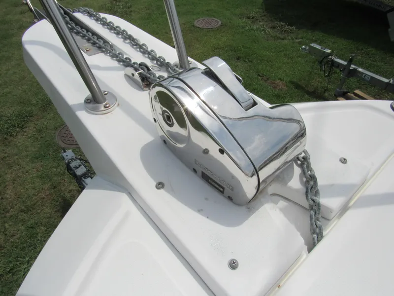 Slide: The Image of Close-up of a 1997 Boston Whaler 23 Conquest boat's anchor windlass system. - 19