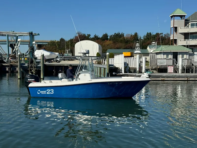 Slide: The Image of Coastal Coastal 23 Center Console 2015 - 2