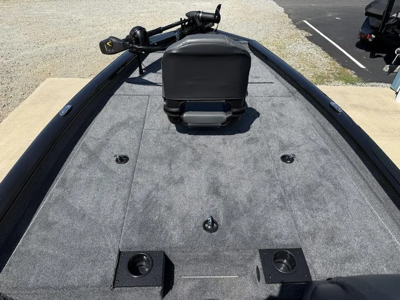 Slide: The Image of 2025 Tracker Pro Team 190 boat deck with gray carpet and seating. - 3