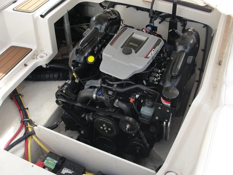 Slide: The Image of Engine compartment of a 2014 Monterey M5 boat, featuring a 350 MAG engine. - 28