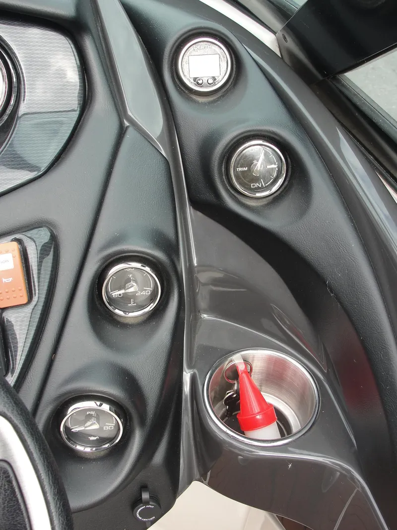 Slide: The Image of Dashboard of 2014 Monterey M5 boat with gauges and controls. - 47