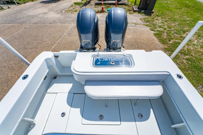 Slide: The Image of 2022 Contender 25T boat with dual 150 horsepower engines, rear deck view. - 15