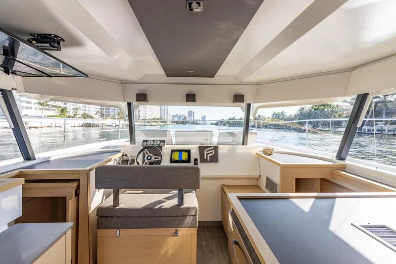 Slide: The Image of Interior view of 2017 Fountaine Pajot MY 37 yacht cockpit with modern design and panoramic windows. - 23