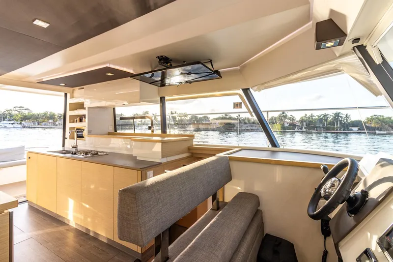 Slide: The Image of Luxurious interior of 2017 Fountaine Pajot MY 37 yacht with modern kitchen and helm. - 24
