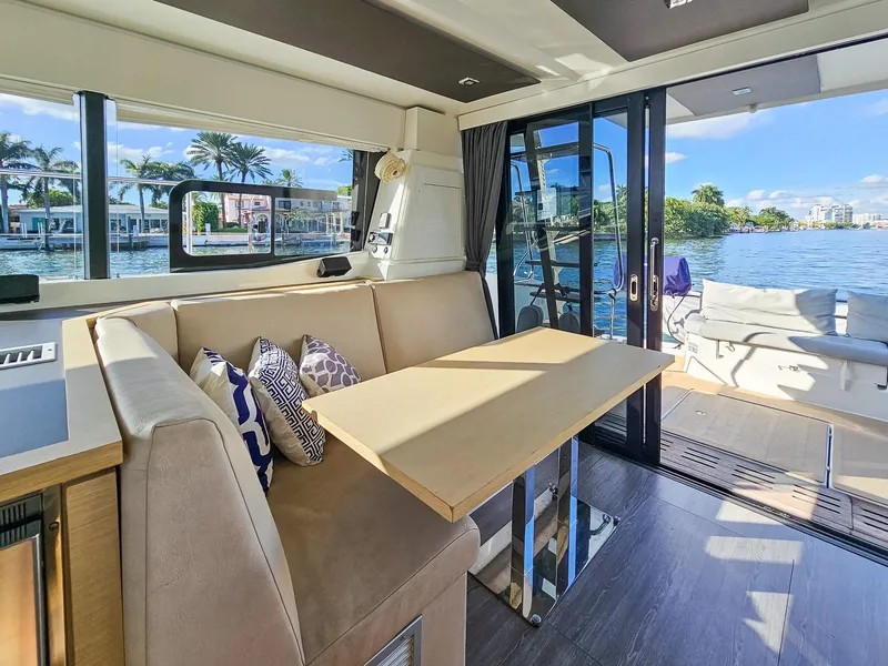 Slide: The Image of Interior of 2017 Fountaine Pajot MY 37 yacht with dining area and scenic water view. - 27