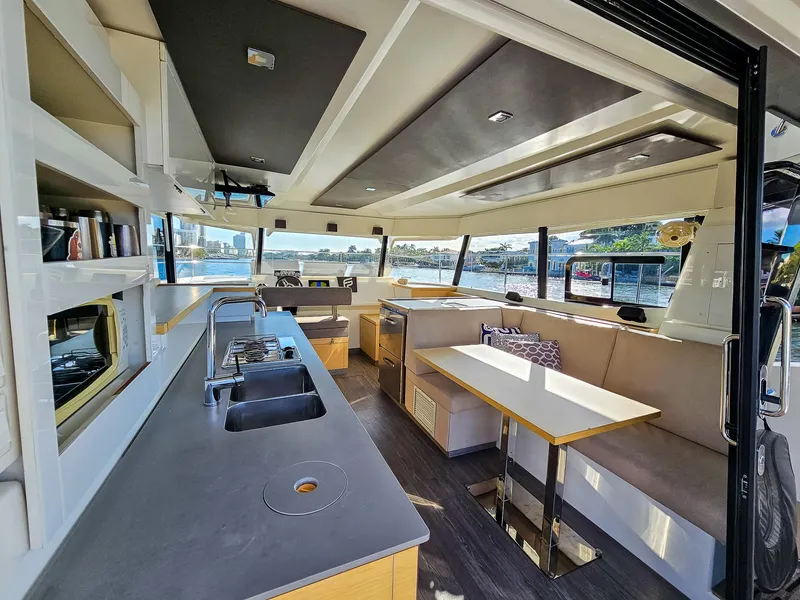 Slide: The Image of Interior of 2017 Fountaine Pajot MY 37 yacht with modern kitchen and dining area. - 28