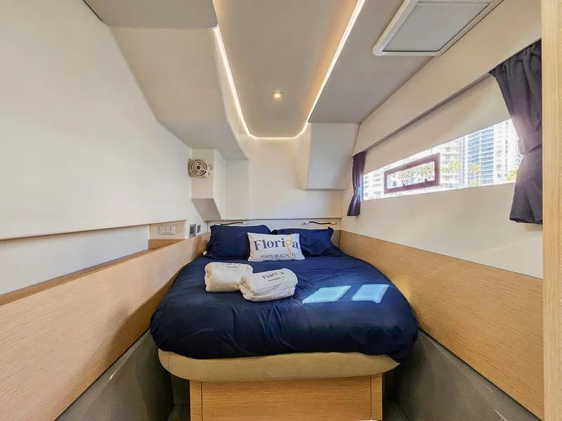 Slide: The Image of Cozy cabin interior of 2017 Fountaine Pajot MY 37 yacht with bed and window view. - 41