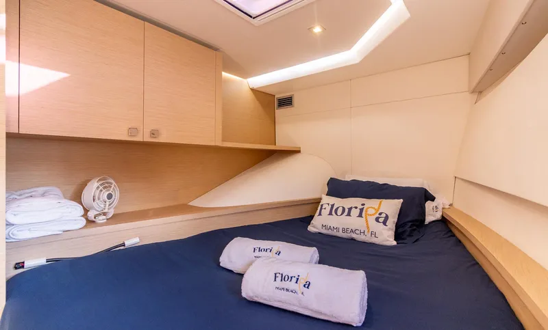 Slide: The Image of Cozy cabin interior of 2017 Fountaine Pajot MY 37 yacht with Florida-themed bedding. - 45