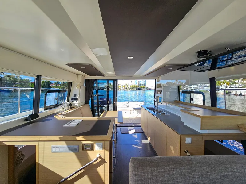 Slide: The Image of Interior of 2017 Fountaine Pajot MY 37 yacht, featuring modern design and waterfront view. - 26