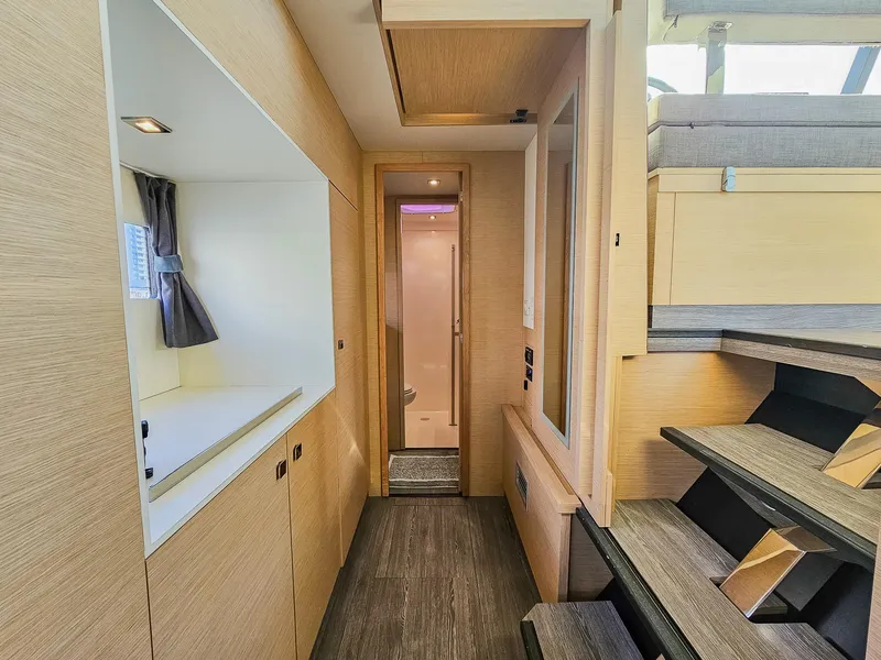 Slide: The Image of Interior of 2017 Fountaine Pajot MY 37 yacht, featuring modern design and wooden finishes. - 37