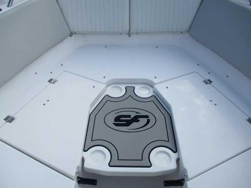 Slide: The Image of 2023 Sea Fox 268 Traveler boat deck with logo and cup holders. - 15