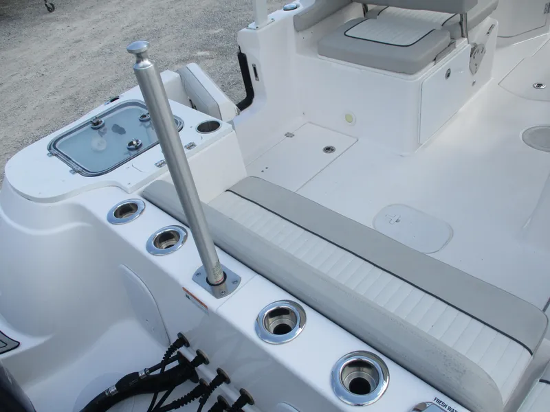 Slide: The Image of 2023 Sea Fox 268 Traveler boat interior with seating and rod holders. - 9