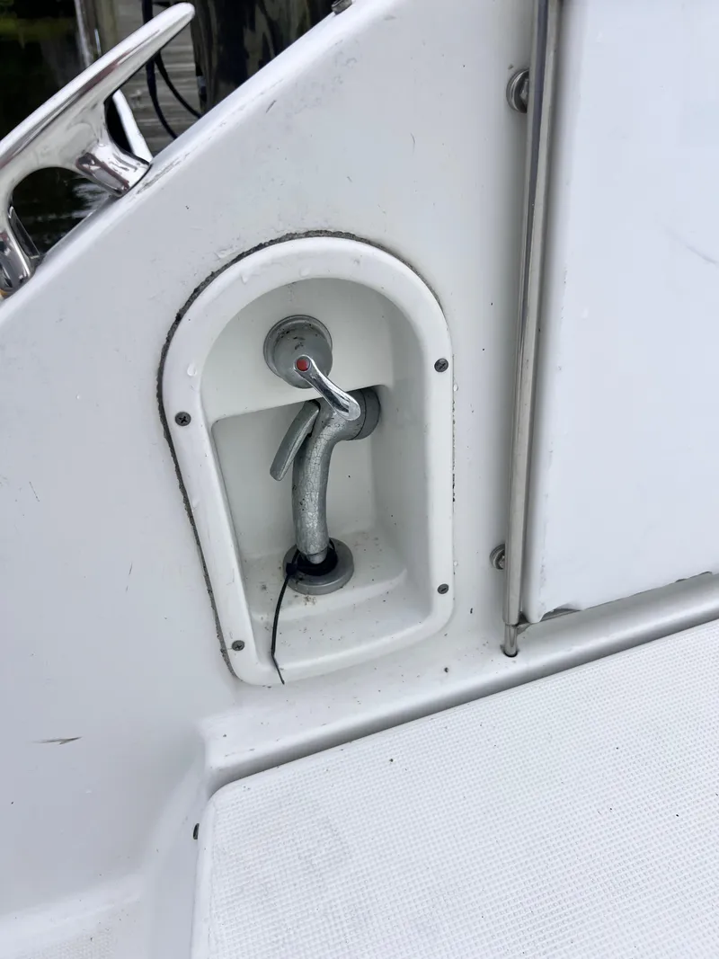 Slide: The Image of Boat cleat on 2005 Formula 330 Sun Sport, integrated into white deck. - 13