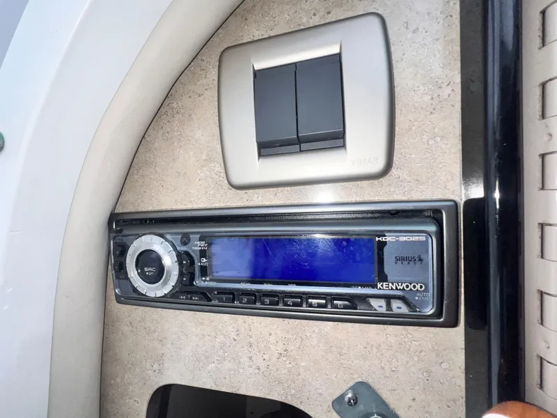 Slide: The Image of Kenwood stereo system in 2005 Formula 330 Sun Sport boat interior. - 43