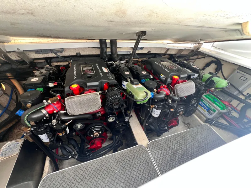 Slide: The Image of Engine compartment of a 2005 Formula 330 Sun Sport boat, featuring dual Volvo Penta engines. - 46