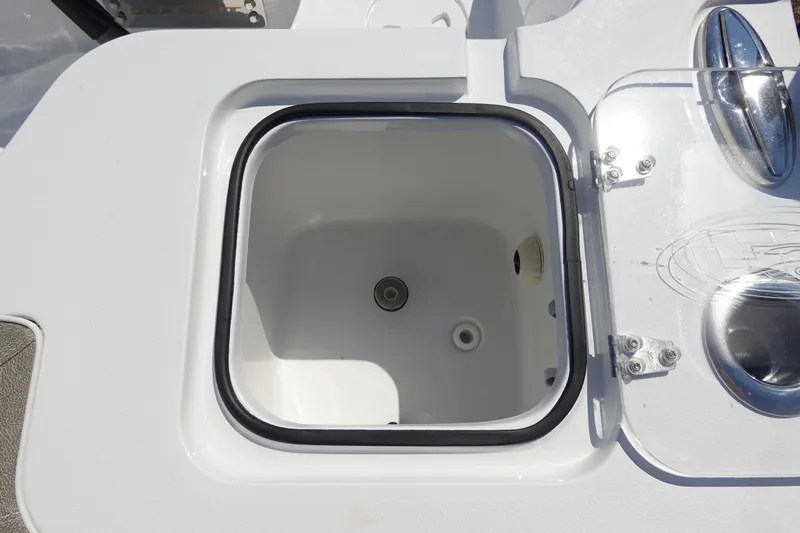 Slide: The Image of Livewell compartment on 2026 Sea Hunt Gamefish 27 boat, featuring a sleek design. - 14