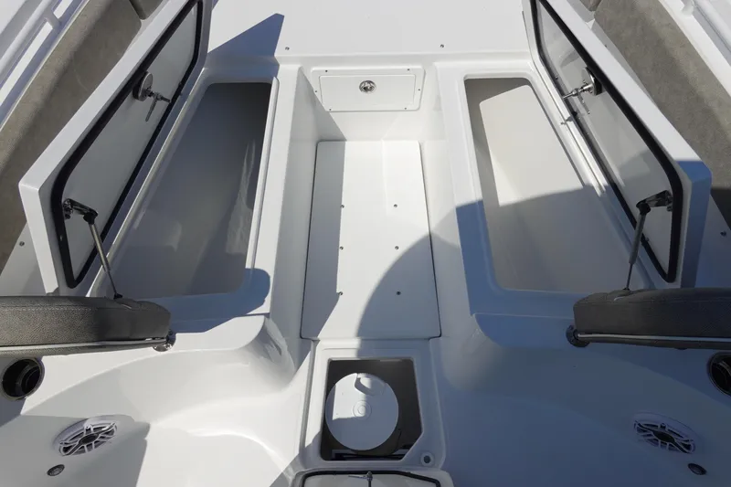 Slide: The Image of 2026 Sea Hunt Gamefish 27 boat interior with open storage compartments. - 28